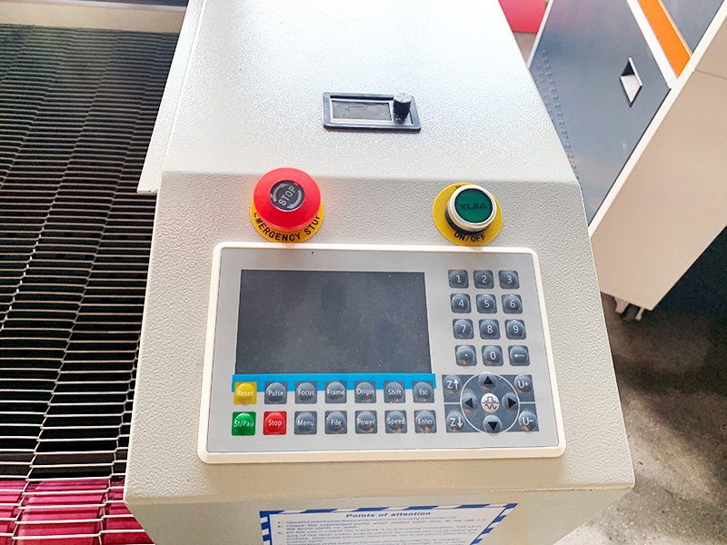 CNC Laser Fabric Cutter for Home Use with Automatic Feeder CNC Laser Fabric Cutter for Home Use with Automatic Feeder