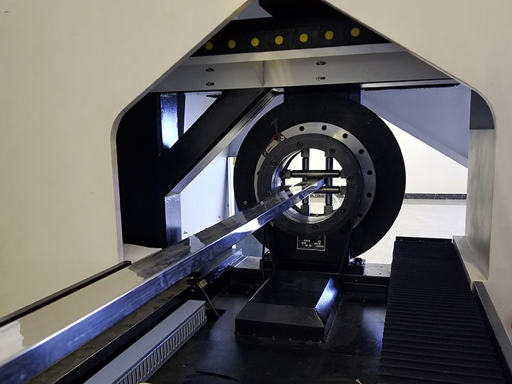 Laser tube cutting machine rotary device