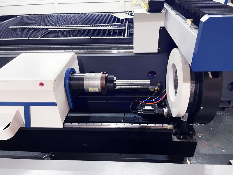 Fiber laser metal cutting machine with rotary attachment