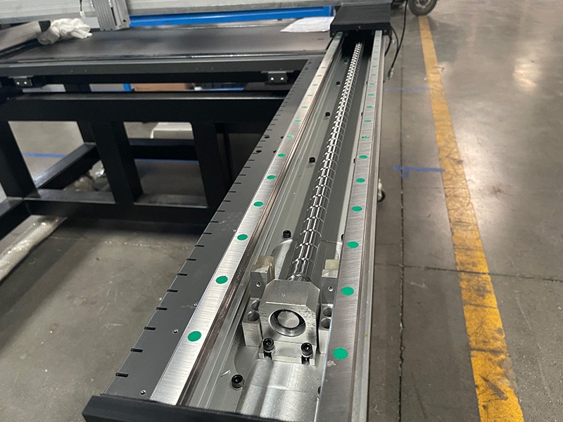 Dual guide rails and grind ballscrew driving