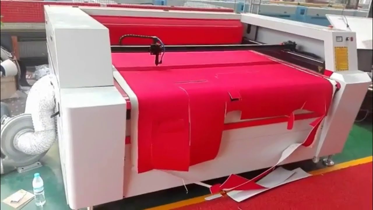 CNC Laser Fabric Cutter for Home Use with Automatic Feeder CNC Laser Fabric Cutter for Home Use with Automatic Feeder